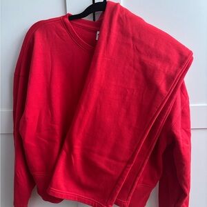 Woman’s Reebok Vibrant Red 2-piece sweat set